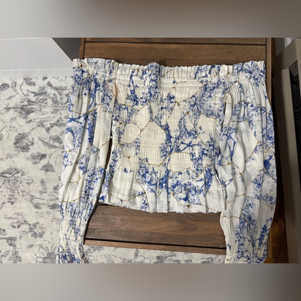 Blue and White top with ruffles (call out)